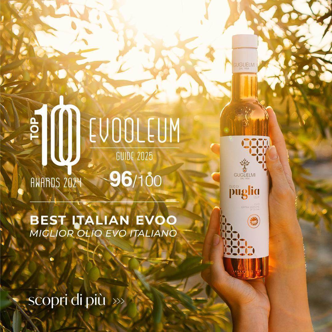 Beste Olijfolie Set 2025: Award-winning Italian olive oil bottle displayed against sunlit olive trees with Evooleum rating