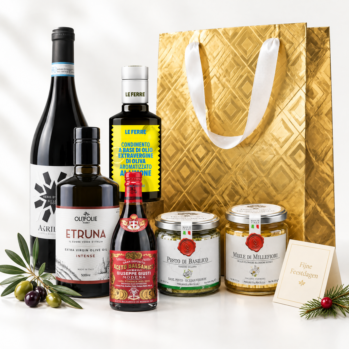 Kerstbox Luxe: Etruna Intense Bio, Giusti 3 Medaglie, Akrille Nero d'Avola, citroen olijfolie, pistachepesto en Siciliaanse honing met gouden cadeautas en kerstkaart
